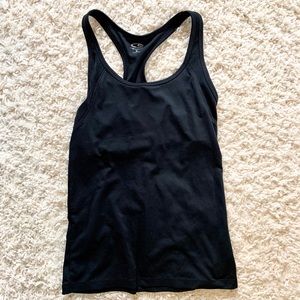 Fitted dri fit tank top, size small.